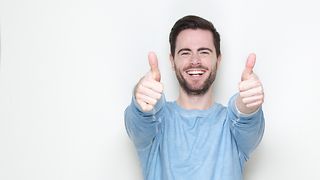 Man showing thumbs up.